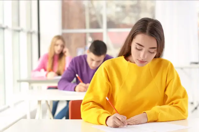 student taking exam - featured image