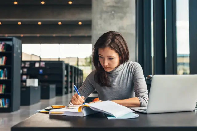 female student reviewing for exam