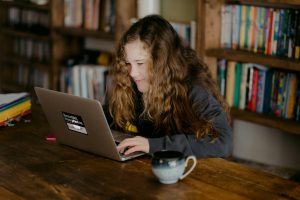 girl using Macbook - featured image