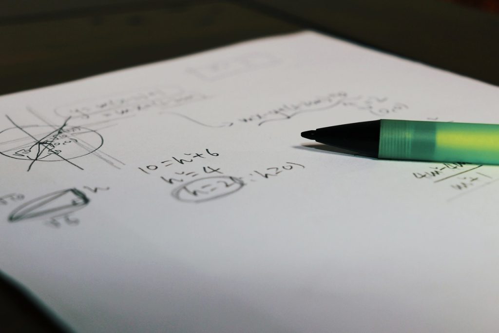 math exam paper and pen - featured image